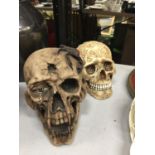 TWO SKULL ORNAMENTS