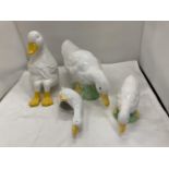 FOUR CERAMIC DUCK FIGURES OF GRADUATING SIZES