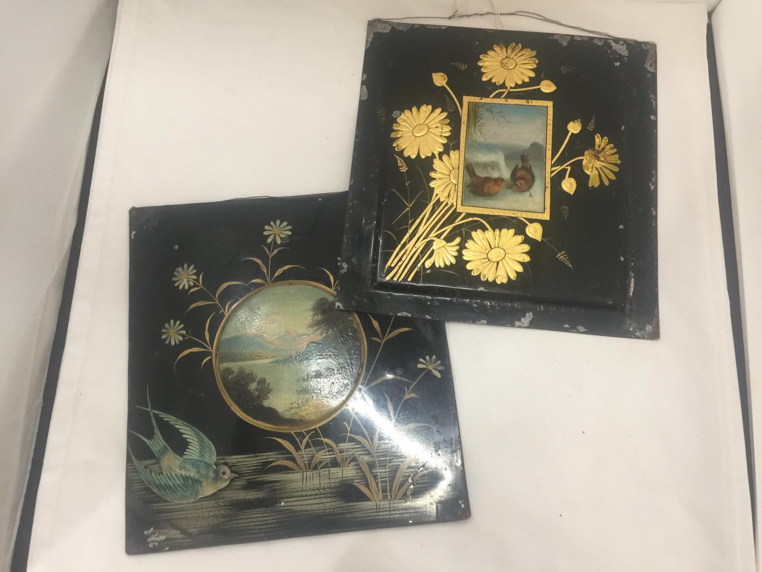TWO VINTAGE METAL WALL PLAQUES, BLACK WITH EMBOSSED FLOWERS, ONE HAVING A ROBIN IN THE CENTRE, THE - Image 2 of 4