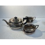 A SILVER PLATED TEAPOT AND SUGAR BOWL