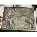 A LARGE BRONZED STONE WALL PLAQUE WITH A VENETIAN LION 72CM X 52.5CM
