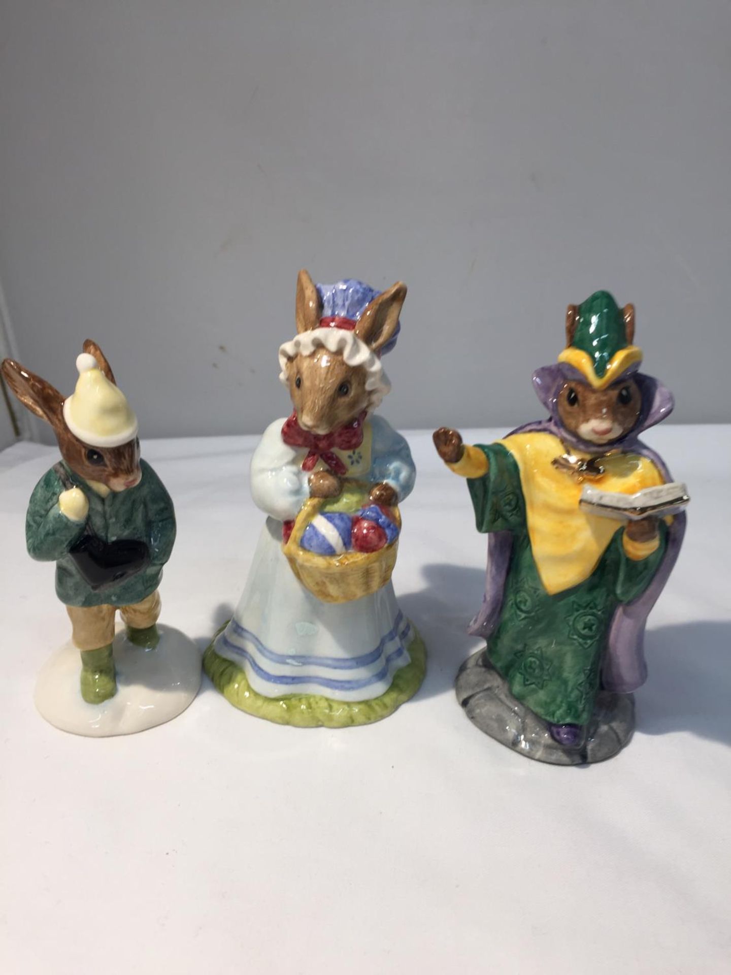 THREE ROYAL DOULTON BUNNYKINS 'MYSTIC BUNNYKINS' DB 197, 'BOY SKATER BUNNYKINS' DB 152 AND 'MRS