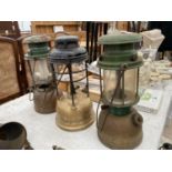 THREE VINTAGE OIL LANTERNS