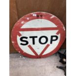 A LARGE CIRCULAR STOP SIGN