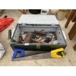 A WOODEN TOOL BOX WITH CONTENTS TO INCLUDE SAWS, PLANE, MALLET, HAMMER ETC