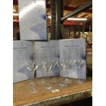 EIGHT BOXED WEDGWOOD CRYSTAL CHAMPAGNE FLUTES