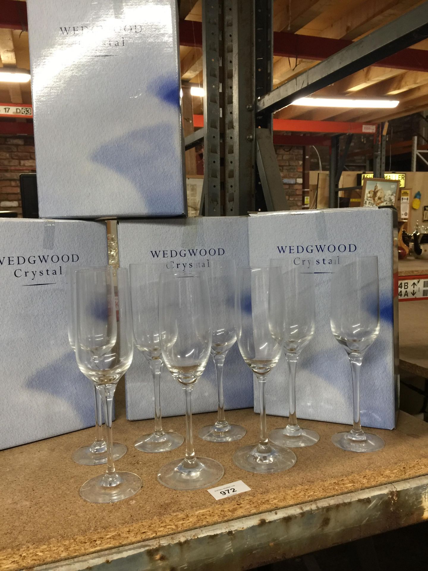 EIGHT BOXED WEDGWOOD CRYSTAL CHAMPAGNE FLUTES