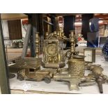 A LARGE COLLECTION OF BRASS ITEMS TO INCLUDE CANDLESTICKS, ANNIVERSARY CLOCK, BOXES, TAPS, VINTAGE