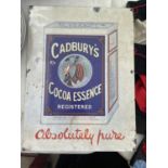 A CADBURYS COCOA ESSENCE TIN SIGN