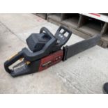 A HOMELITE PETROL CHAINSAW