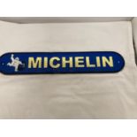 A CAST BLUE AND YELLOW 'MICHELIN' SIGN 49.5CM X 9CM