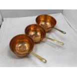 THREE VINTAGE GRADUATED COPPER AND BRASS HANDLED SIEVES