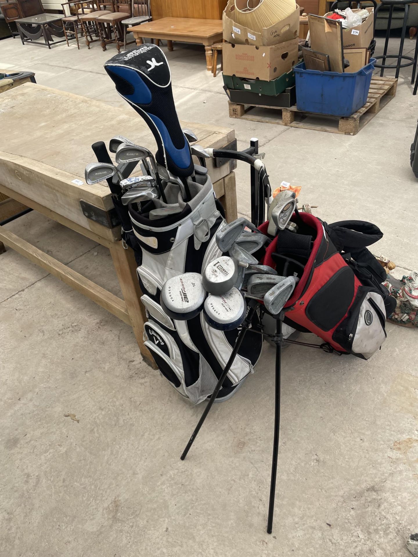 TWO GOLF BAGS AND VARIOUS CLUBS