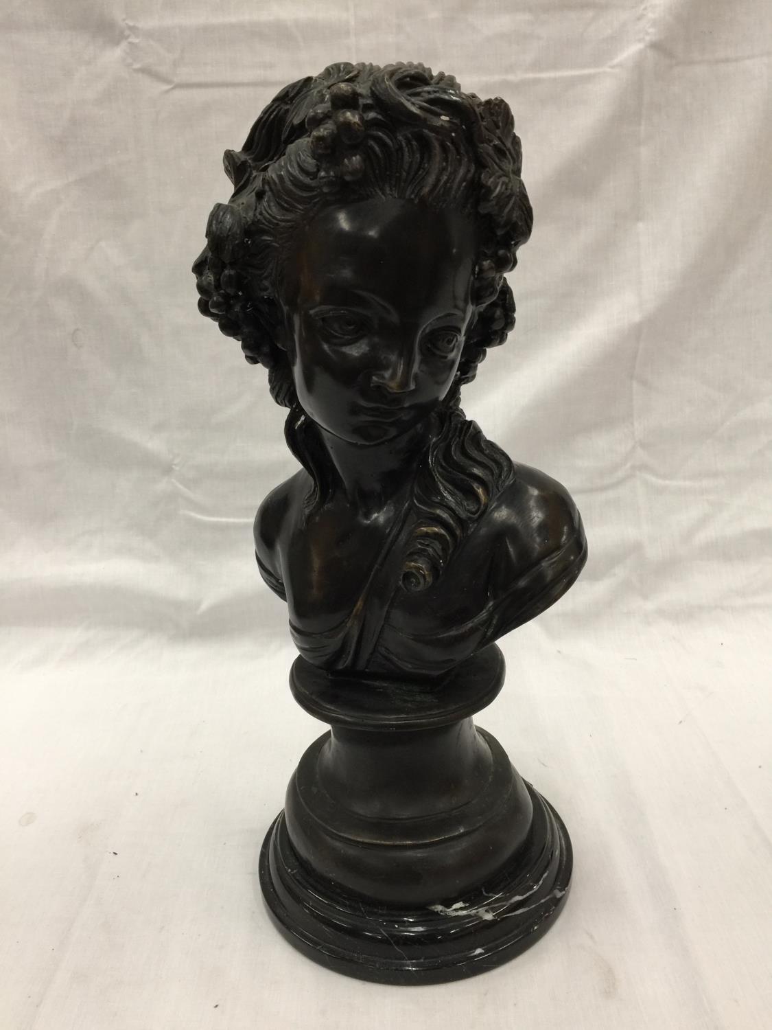 A METAL BUST OF A GIRL ON A MARBLE PLINTH APPROX 47CM