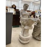 A RECONSTITUTED STONE BIRD BATH IN THE FORM OF A MERMAID