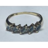 A 9 CARAT GOLD RING WITH AQUAMARINES AND DIAMONDS SIZE M/N