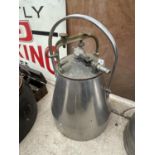 A GALVANISED MILK BUCKET WITH A CLUSTER ATTACHMENT LID