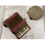 A HOHNER MIGNON 1 ACCORDIAN IN WORKING ORDER AT TIME OF CATALOGUING AND A VINTAGE TAMBOURINE