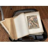 A VINTAGE SUITCASE CONTAINING A LARGE ILLUSTRATED HOLY BIBLE