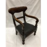 AN 1860'S VICTORIAN CHILD'S OAK CHAIR WITH TURNED LEGS AND A PADDED SEAT
