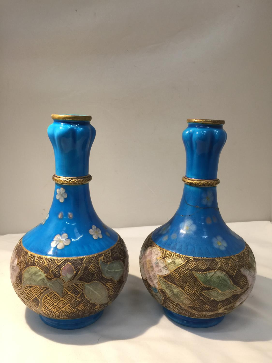 A PAIR OF MINTON CHRISTOPHER DRESSER DESIGN VASES, A/F - BOTH HAVE HAD EXTENSIVE REPAIRS