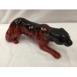 A PANTHER / JAGUAR MARKED ROYAL DOULTON FLAMBE - SIGNED 'NOKE' TO BASE. THERE IS A MANUFACTURING