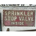 A BELIEVED ORIGINAL CAST IRON SPRINKLER STOP VALVE INSIDE SIGN 31CM X 61CM