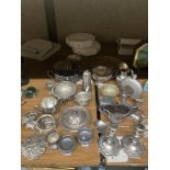 A LARGE QUANTITY OF SILVER PLATED ITEMS TO INCLUDE AN EARLY ELKINGTON'S PIECE, TRAYS,