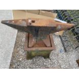 A VINTAGE BLACKSMITHS ANVIL LENGTH ON A BASE 97CM