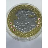 A SILVER GILT 2008 £5 COIN DEPICTING GEORGE AND THE DRAGON WITH RUBIES