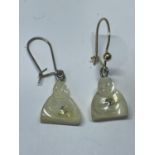 A PIR OF YELLOW METAL EARRINGS MARKED 375 WITH PEARLISED AND CLEARSTONE FIGURE DROPS (HOOPS NOT