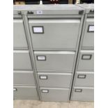 A SILVERLINE FOUR DRAWER FILING CABINET WITH KEY