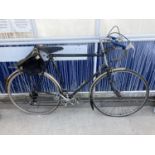 A VINTAGE CARLTON DROP HANDLED RACING BIKE WITH A TEN SPEED GEAR SYSTEM