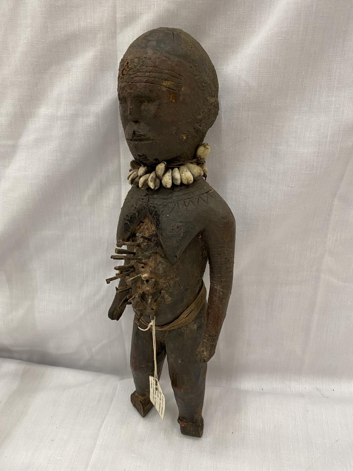 TWO HAND CARVED AFRICAN TRIBAL FIGURES, ONE BEING A FEMALE FERTILITY FIGURE. THE NAILS ARE TO - Image 12 of 16