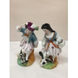A PAIR OF EARLY STAFFORDSHIRE HARD PASTE PORCELAIN FIGURES OF A BOY AND A GIRL WITH DOGS HEIGHT BOTH