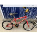 A CHILDS MENACE RIDER BIKE