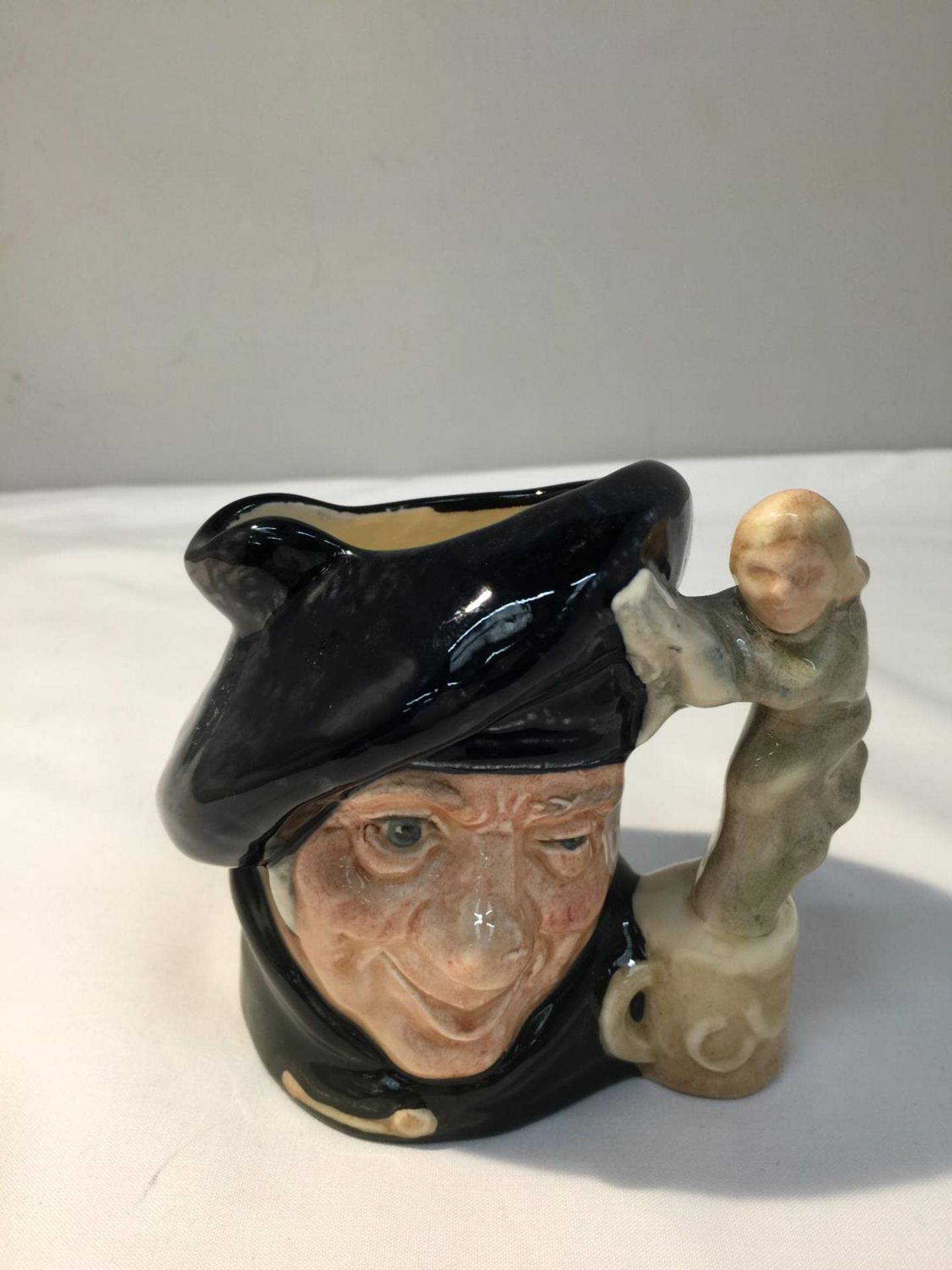 A ROYAL DOULTON SMALL TOBY JUG 'TAM O' SHANTER' D6636 HEIGHT 10.5CM