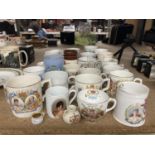 A QUANTITY OF ROYAL COMMEMORATIVE WARE MUGS AND CUPS