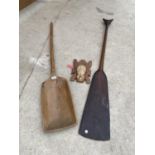 A WOODEN BOAT ORE, A WOODEN FLOUR SHOVEL AND A TRIBAL MASK