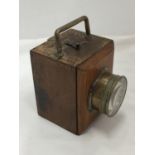 A WOODEN MINING INSPECTION LAMP WITH BRASS FITTING - WORKING AT TIME OF CATALOGUING