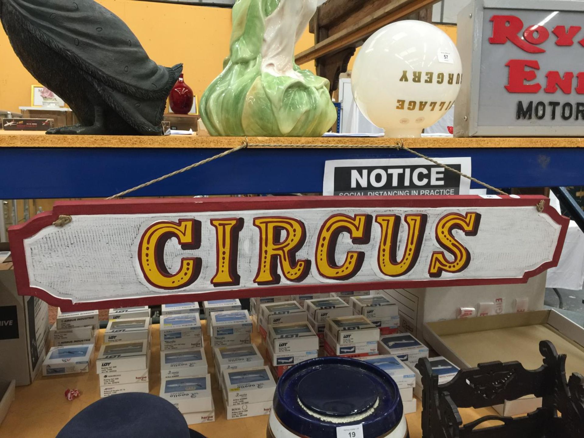 A PAINTED WOODEN CIRCUS HANGING SIGN W: 100CM