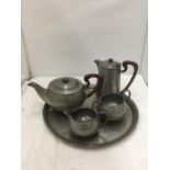 A PEWTER TEASET TO INCLUDE TEAPOT, HOT WATER POT, CREAM JUG, SUGAR BOWL AND A TRAY