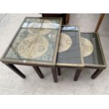 A MILITARY CAMPAIGN STYLE NEST OF THREE WORLD MAP TABLES