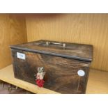 A VINTAGE METAL CASH TIN WITH DOUBLE LOCKING MECHANISM