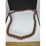 AN AMBER NECKLACE