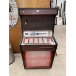 A VINTAGE WINCHESTER JUKEBOX MACHINE