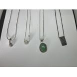 FOUR MARKED SILVER NECKLACES WITH PENDANTS TO INCLUDE A CLEAR STONE BALL AND A GREEN STONE