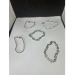 FIVE SILVER BRACELETS TO INCLUDE A TURQOISE STONE AND A CLEAR STONE