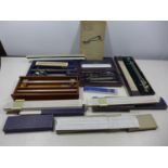 A COLLECTION OF NAVAL ARCHITECTS DRAWING INSTRUMENTS, TO INCLUDE A PLANIMETER, RULERS, SLIDE
