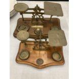 TWO SETS OF WOOD AND BRASS POSTAL SCALES WITH WEIGHTS